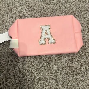 New pink “A” makeup vinyl bag